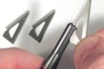 Remove the blades from the broadhead body