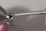 Remove the tip from the front of the broadhead body